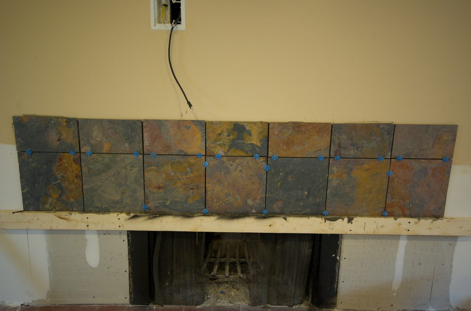 Fireplace tile is going up!